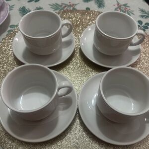 Set of 4 small coffee cups with saucers